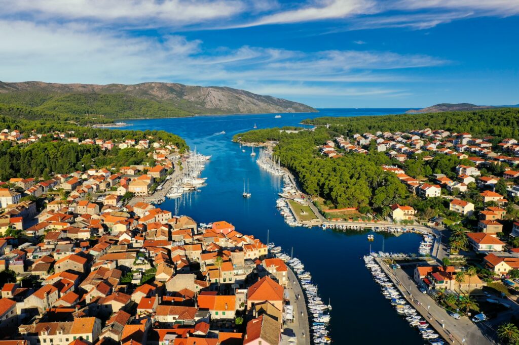 Sailing in Croatia. "Discover the Enchanting Beauty of Croatia's hidden gems and Crystal Clear Waters" 5 Aerial sunset view of Stari Grad, a town at Hvar island, Croatia