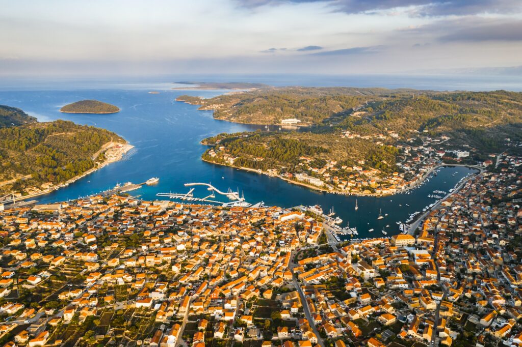 Sailing in Croatia. "Discover the Enchanting Beauty of Croatia's hidden gems and Crystal Clear Waters" 4 Aerial view of Vela Luka town on Korcula island, Croatia