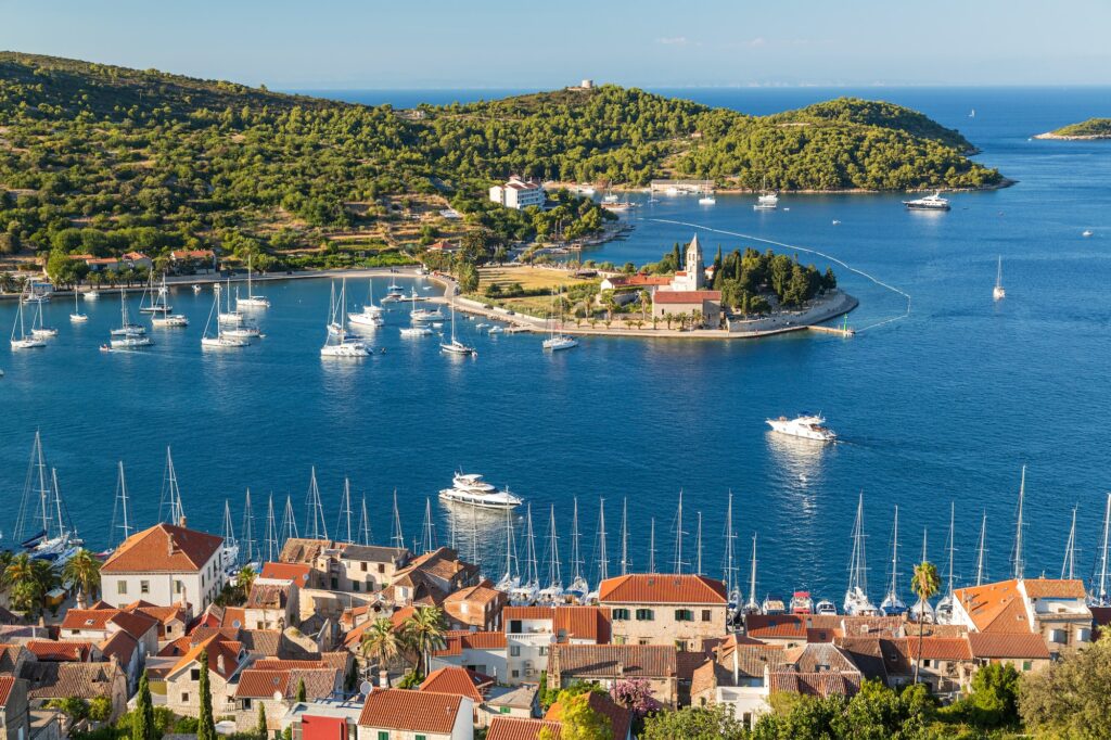 Sailing in Croatia. "Discover the Enchanting Beauty of Croatia's hidden gems and Crystal Clear Waters" 2 Vis town, Franciscan monastery and harbour, Vis Island, Croatia